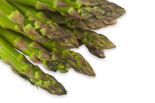 Fresh green asparagus exposed on a white background