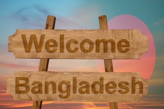 welcome to bangladesh sing on wood background with blending national flag