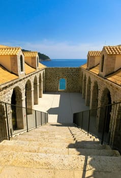 Dubrovnik, Croatia - June 07, 2015: View on the fortress and marina in the old town of Dubrovnik, Croatia. Dubrovnik is a UNESCO World Heritage site