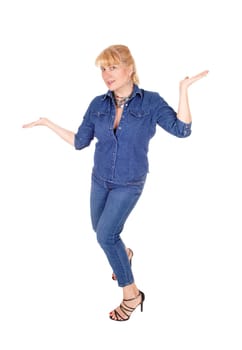 A lovely woman in jeans and jeans jacket standing isolated for white .background gesturing with her hands..