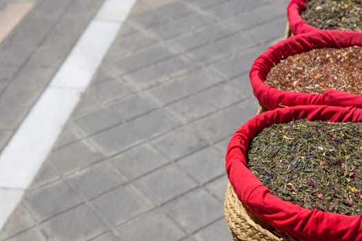 Spices, seeds and tea sold in a traditional street market