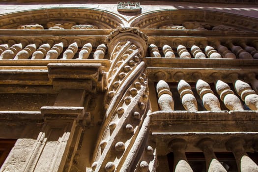 Baroque stone decoration beside the Royal Chapel outdoors at Granada Cathedral, Spain
