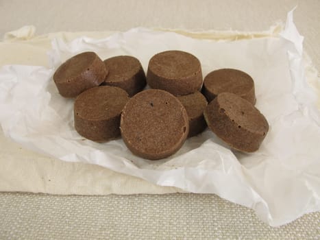 Homemade vegan chocolate with cocoa butter,coconut oil,rice syrup and cocoa