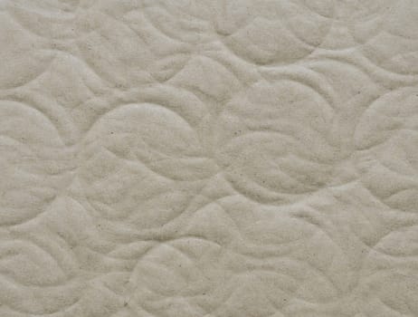 Recycled corrugated cardboard paper texture background with debossed circle shape