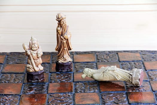 The game - Two win,one loses. Battle in life and in chess
