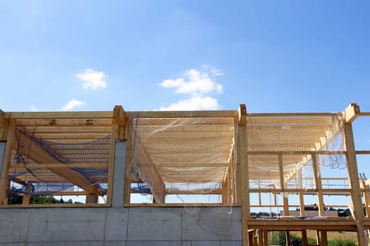 Safety net at a construction site. Safety net on a wooden shell