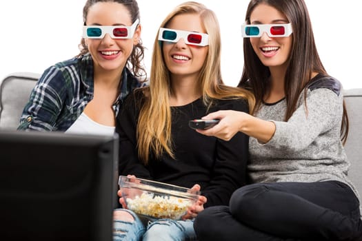 Girls watching 3D movies with popcorn