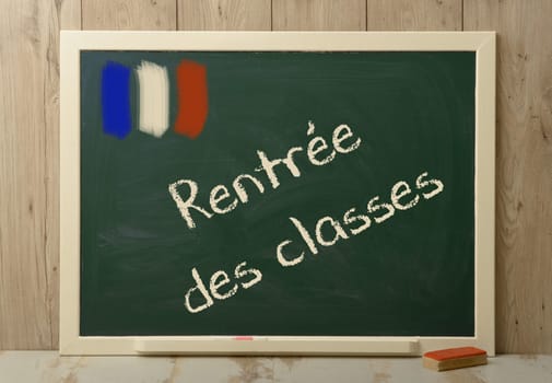 " rentree de classes"" back to school written on agreen blackboard"