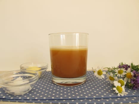 Butter coffee in a glass with butter and coconut oil