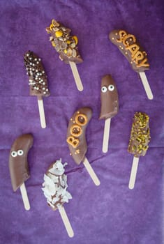Chocolate bananas with nudes and Halloween décor