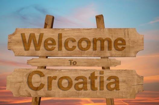 welcome to croatia sing on wood background