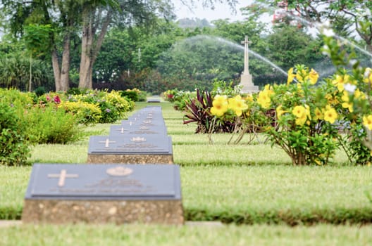KANCHANABURI, THAILAND - MAY 3, 2014: Chungkai War Cemetery this is historical monuments where to respect prisoners of the World War 2 who rest in peace here, MAY 3, 2014 in Thailand