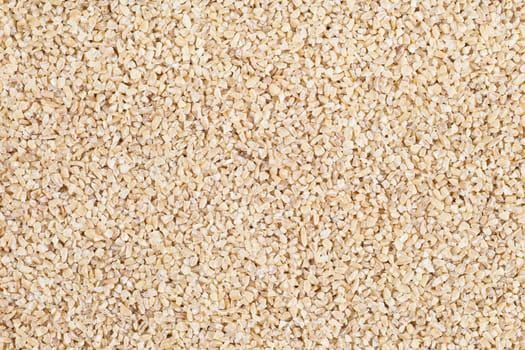 Full frame of bulgur wheat food texture.