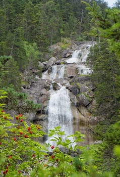 a waterfall in the mountains of the Pyrenees