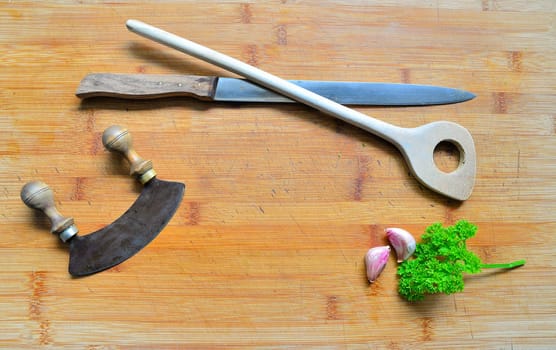 Wooden board and knife
