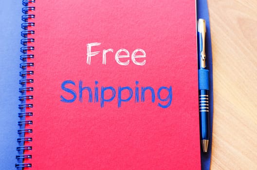 Free shipping text concept write on notebook