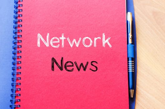 Network news text concept write on notebook