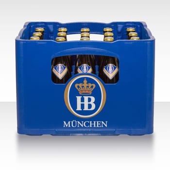 Munich, Germany - June 10, 2016: Plastic crate box case of traditional classic German beer from Bavarian brewery HB Munich.