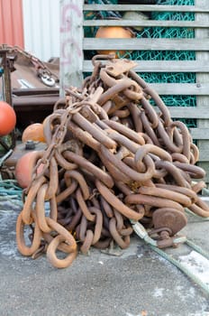 one rusty big chain for a big boat for safe