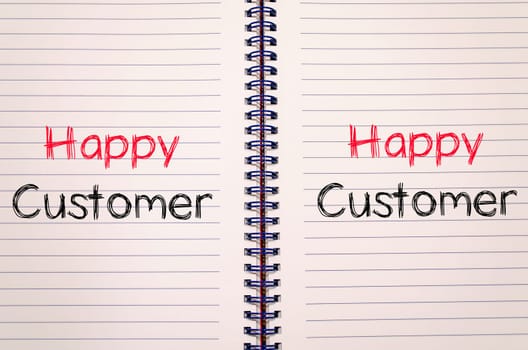Happy customer text concept write on notebook