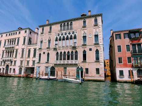 Beautiful view from Grand Canal on colorful facades of old medieval houses in Venice, Italy