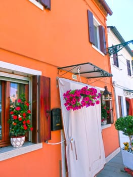 Burano, Venice, Italy - May 10, 2014: Colorful old houses on the Island of Burano near Venice, Italy