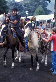 cowboys in the town of Antigua in Guatemala in Central America.