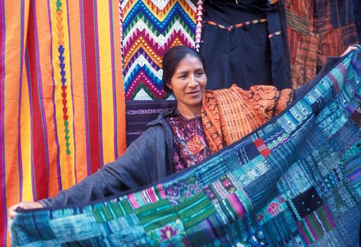 People in traditional clotes at the Market in the Village of Chichi or Chichicastenango in Guatemala in Central America.