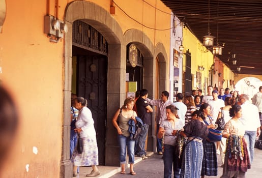 People in the old town in the city of Antigua in Guatemala in Central America.