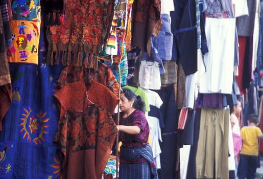 People in traditional clotes at the Market in the Village of Chichi or Chichicastenango in Guatemala in Central America.