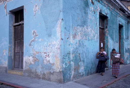 indio women in the old town in the city of Antigua in Guatemala in central America.