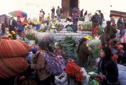 People in traditional clotes at the Market in the Village of Chichi or Chichicastenango in Guatemala in Central America.
