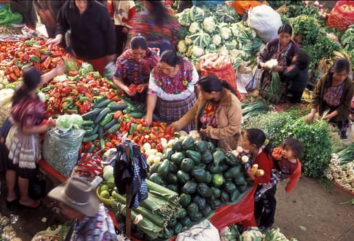 People in traditional clotes at the Market in the Village of Chichi or Chichicastenango in Guatemala in Central America.