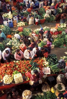People in traditional clotes at the Market in the Village of Chichi or Chichicastenango in Guatemala in Central America.