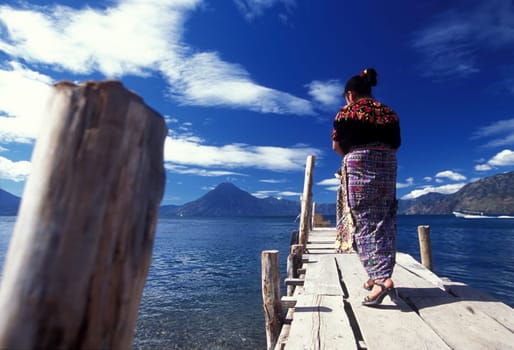The Lake Atitlan mit the Volcanos of Toliman and San Pedro in the back at the Town of Panajachel in Guatemala in central America.