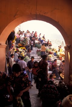 People in traditional clotes at the Market in the Village of Chichi or Chichicastenango in Guatemala in Central America.