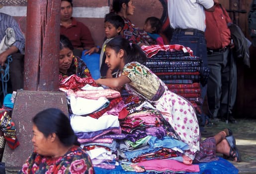 People in traditional clotes at the Market in the Village of Chichi or Chichicastenango in Guatemala in Central America.