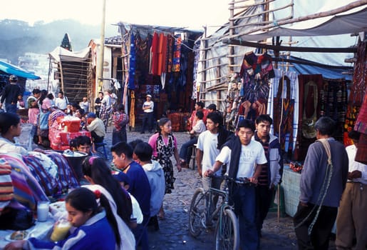 People in traditional clotes at the Market in the Village of Chichi or Chichicastenango in Guatemala in Central America.