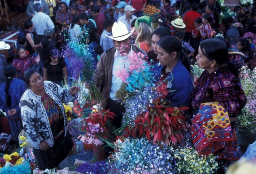 People in traditional clotes at the Market in the Village of Chichi or Chichicastenango in Guatemala in Central America.