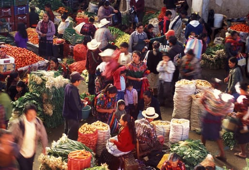 People in traditional clotes at the Market in the Village of Chichi or Chichicastenango in Guatemala in Central America.