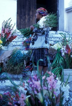 People in traditional clotes at the Market in the Village of Chichi or Chichicastenango in Guatemala in Central America.