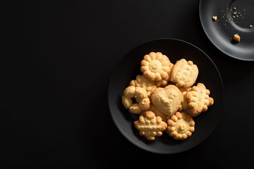 Homemade cookies on black backgrounds close up
