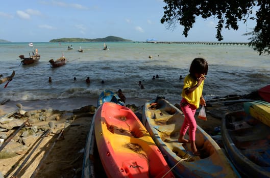 childen on the Beach at the fishmarket in Rawai on the Rawai Beach on the Phuket Island in the south of Thailand in Southeastasia...