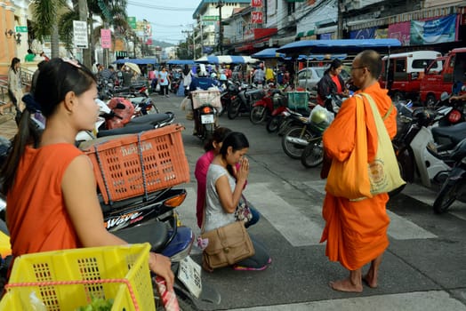 people praying at the day Market in the city of Phuket on the Phuket Island in the south of Thailand in Southeastasia...