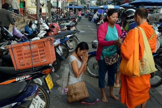 people praying at the day Market in the city of Phuket on the Phuket Island in the south of Thailand in Southeastasia...