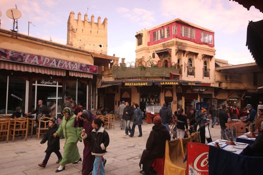 a smal Marketroad in the Medina of old City in the historical town of Fes in Morocco in north Africa.