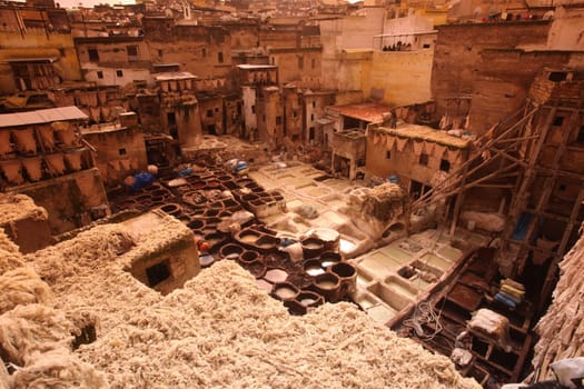The Leather production in the old City in the historical Town of Fes in Morocco in north Africa.