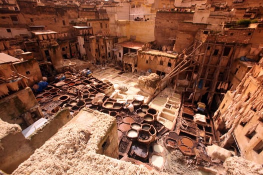 The Leather production in the old City in the historical Town of Fes in Morocco in north Africa.