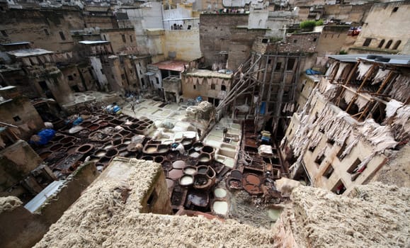 The Leather production in the old City in the historical Town of Fes in Morocco in north Africa.