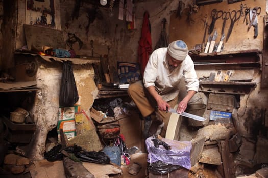 a shop in the Marketroad in the Medina of old City in the historical town of Fes in Morocco in north Africa.